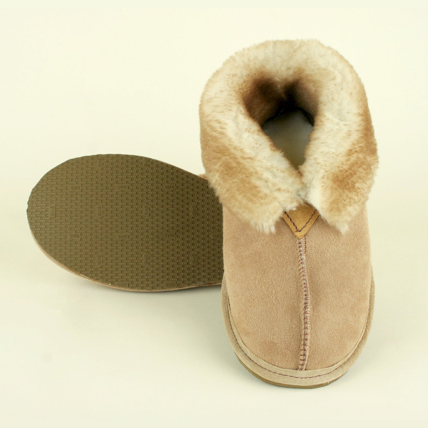 Women's fluffy sheepskin slippers with traction sole, made in USA