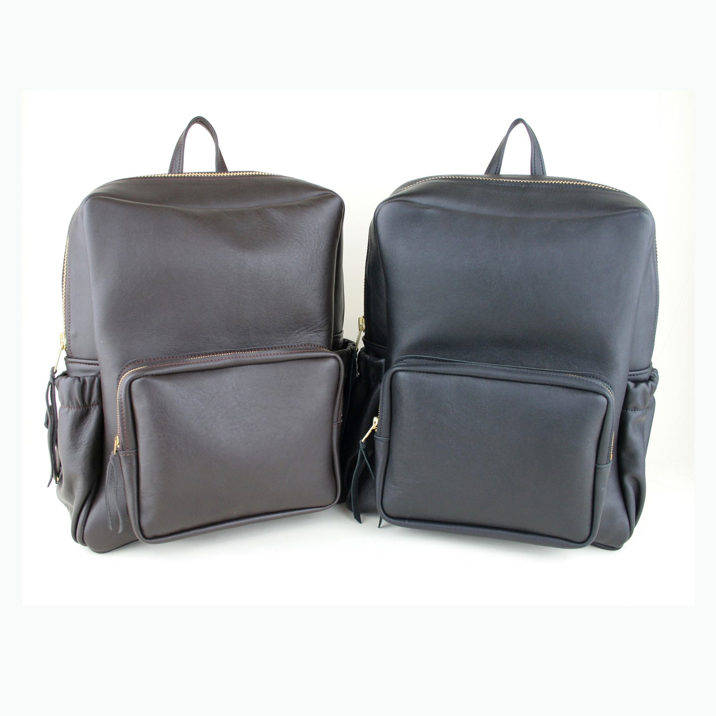 Different colors of large leather backpack made in USA.