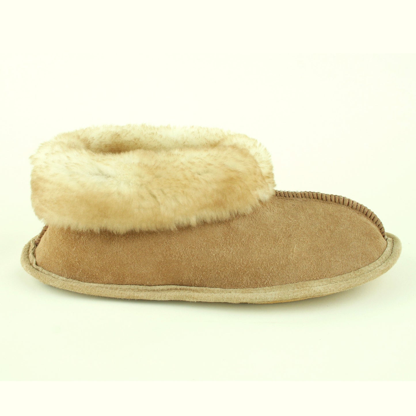 Side view of sheepskin slippers with soft leather sole made in USA.