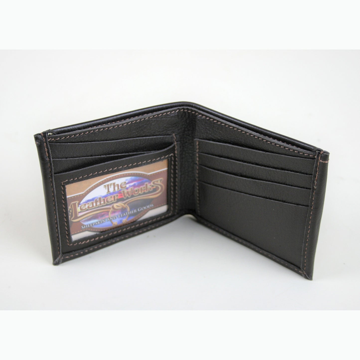 Inside of leather wallet showing the card slots and id window.