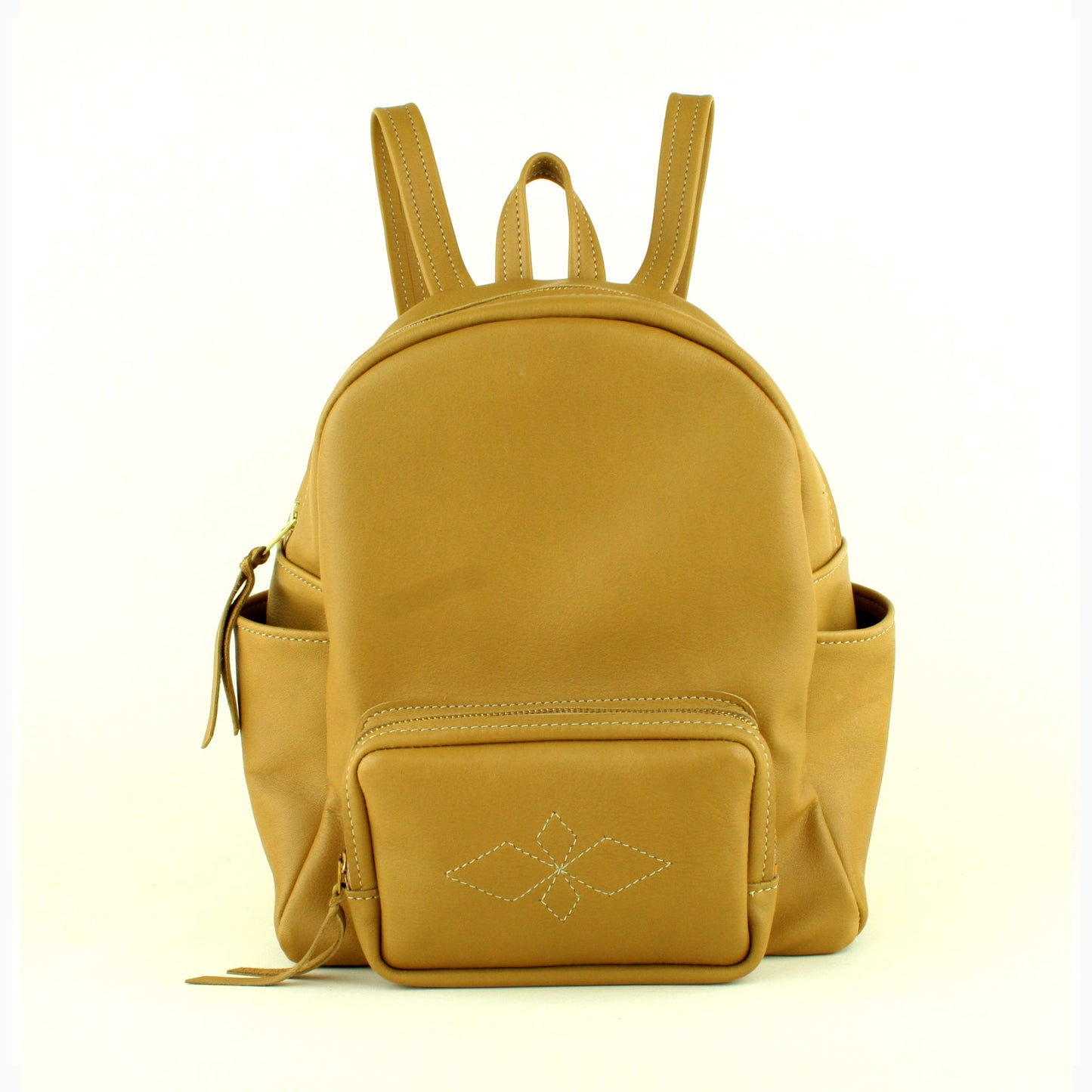Tan leather backpack made in USA.