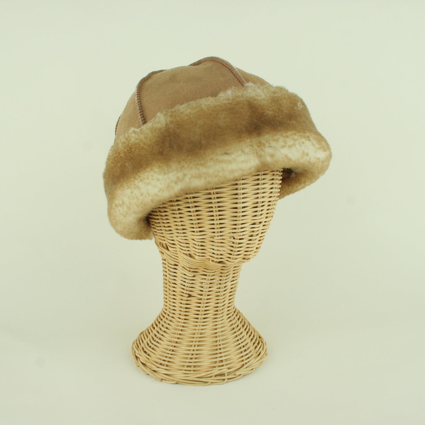 Brown sheepskin hat with brown brim made in USA.