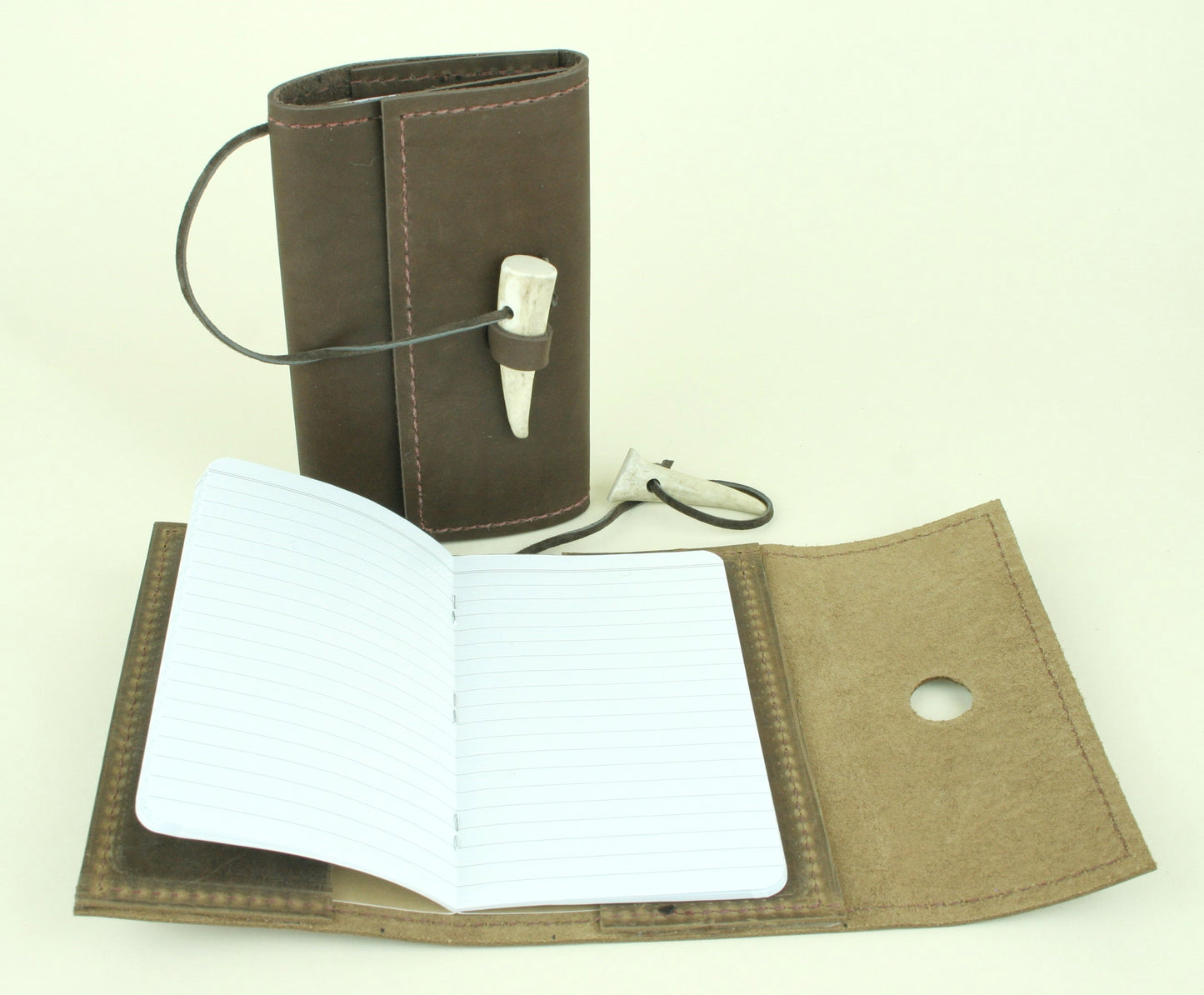 Refillable leather journal with lined paper. Made in USA.