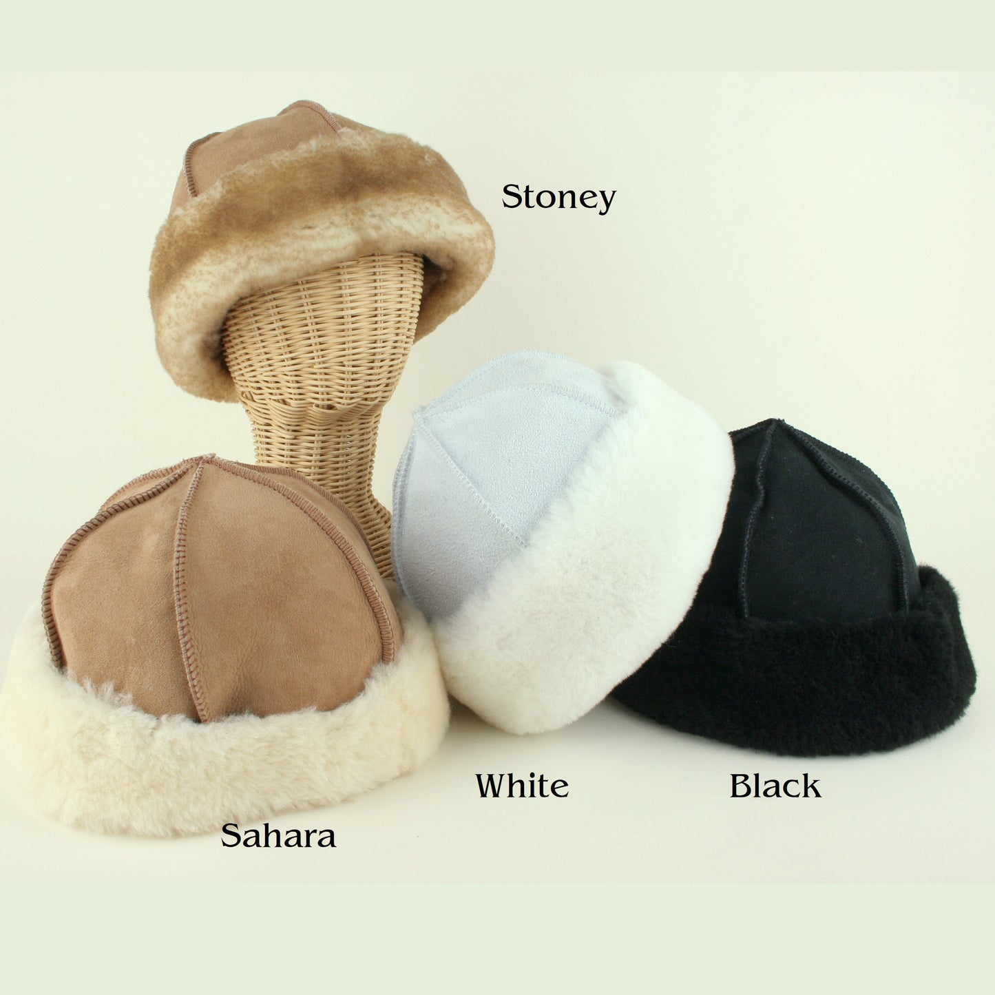 Group shot showing the different colors of sheepskin hat.