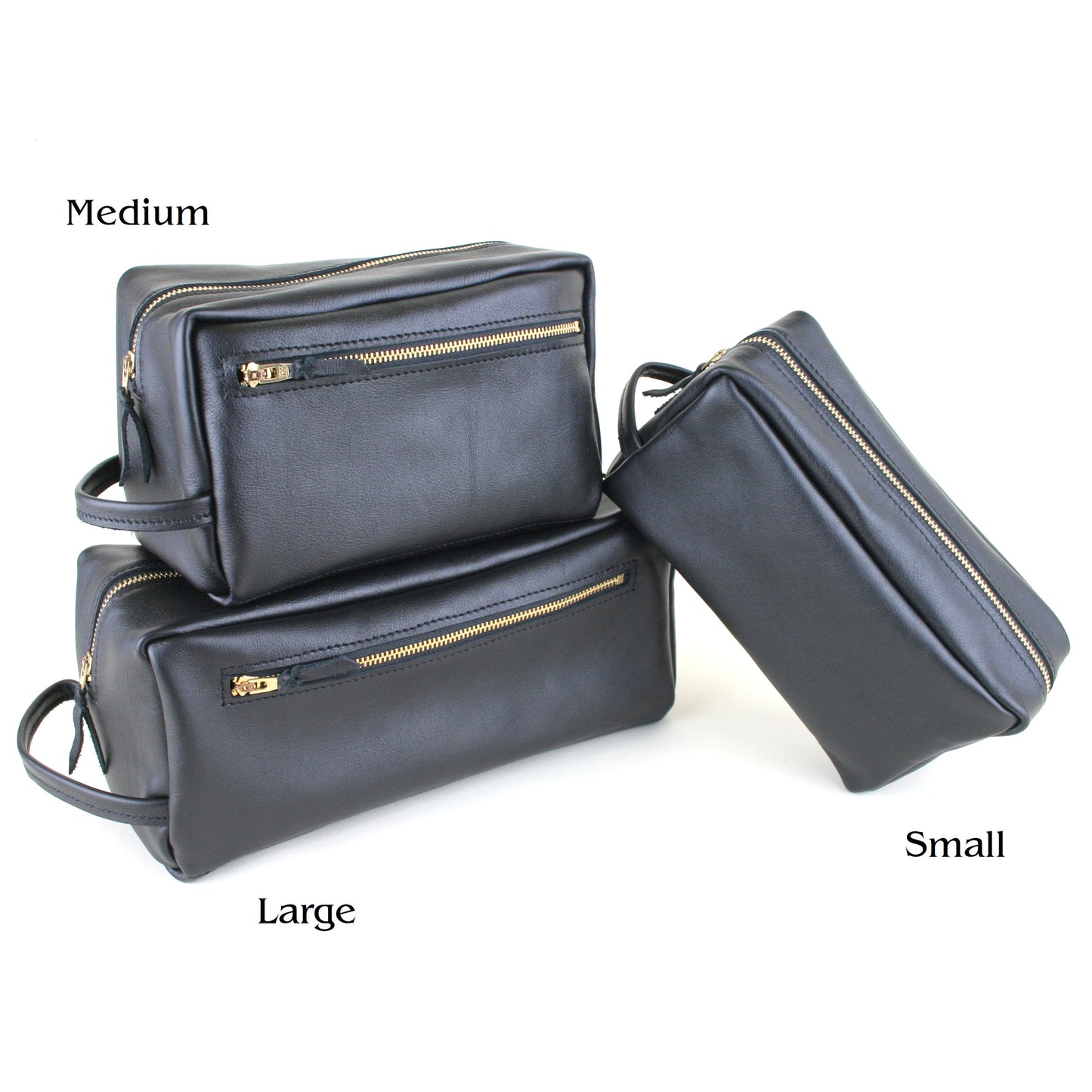 Different sizes of leather toiletry bags.