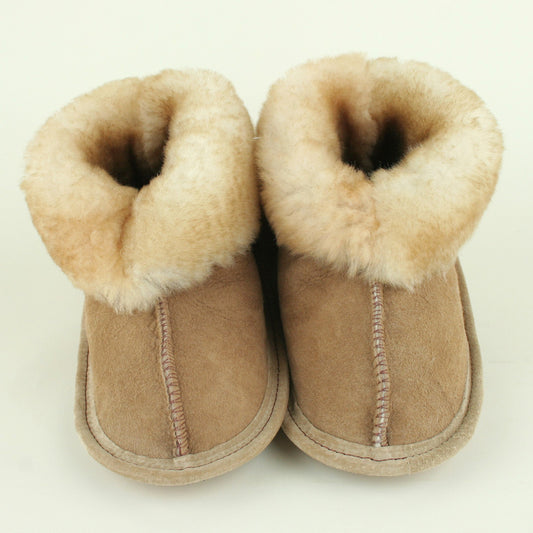 Kids sheepskin slippers with soft leather sole made in USA.