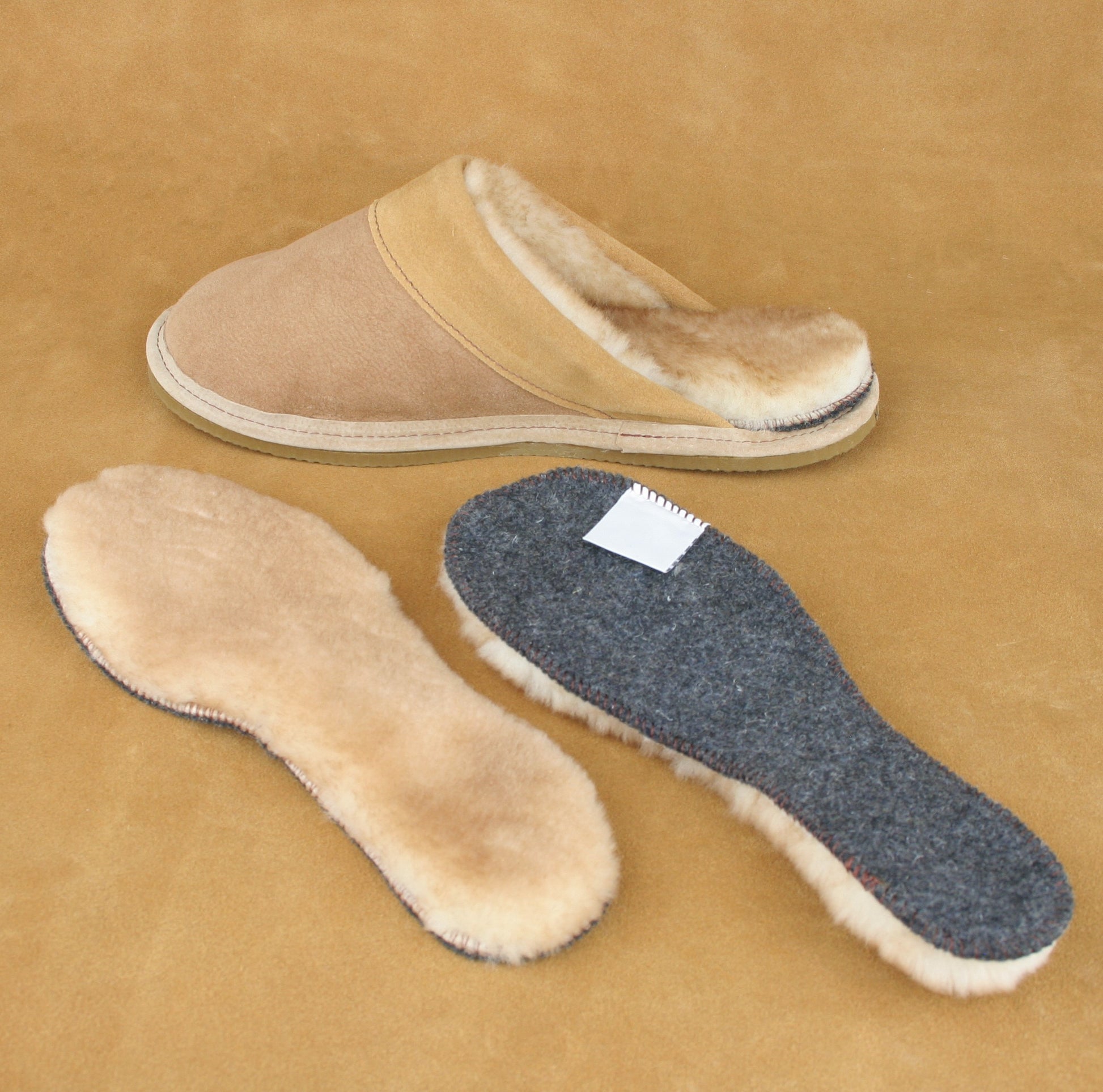 Men's scuff style slipper with the sheepskin innersole removed.