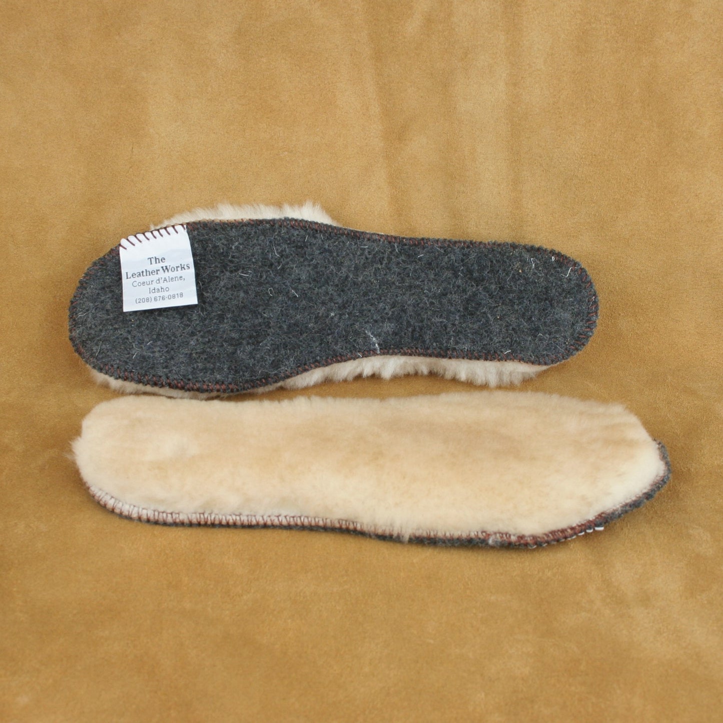 Front and back of sheepskin innersoles.