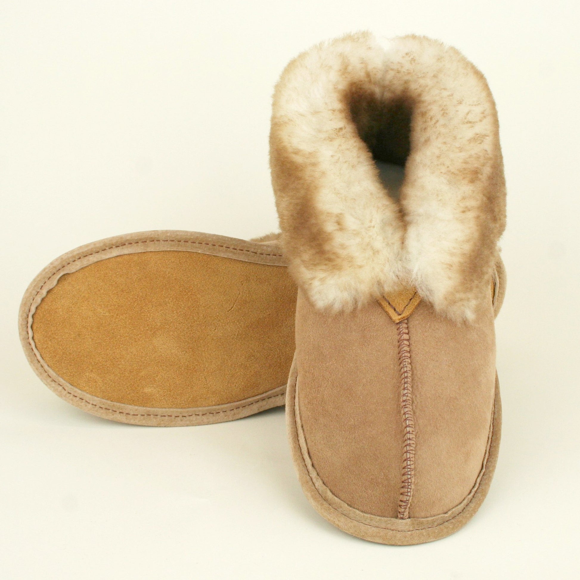Men's sheepskin slipper with soft leather sole. Made in USA.