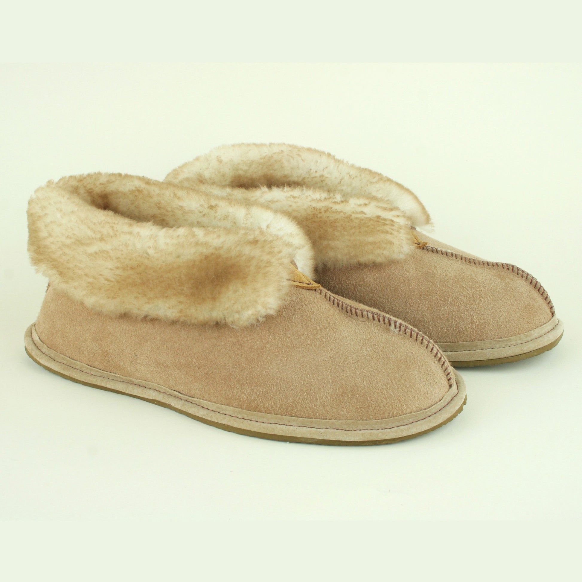 Men's sheepskin slippers with traction sole.